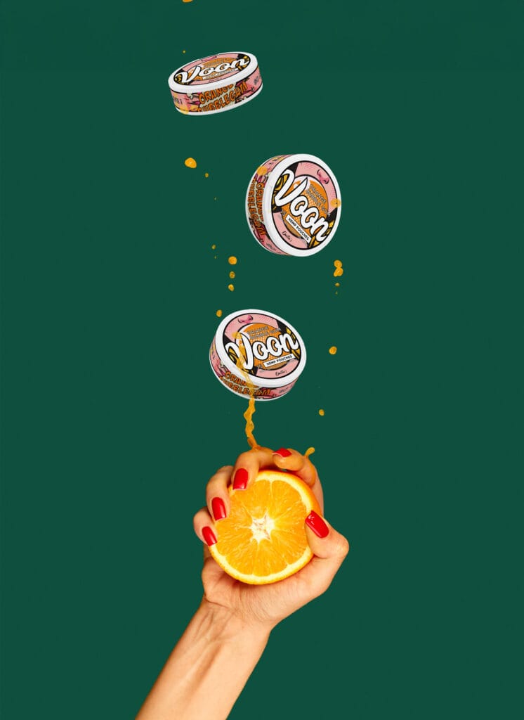 Voon Orange Bubblegum hand and orange